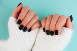 What is 'black nail theory' and how can this beauty trend boost self-confidence?