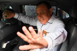 Indonesia suspends anti-graft chief amid extortion probe